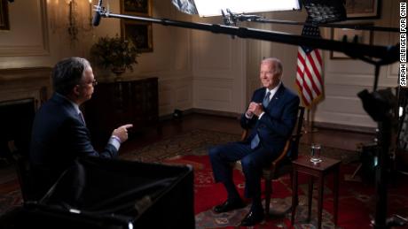 President Joe Biden speaks with CNN&#39;s Jake Tapper during an interview Tuesday in the Map Room of the White House.