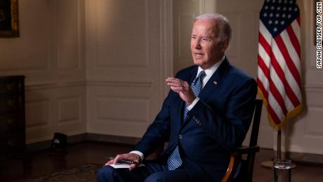 President Joe Biden speaks with CNN&#39;s Jake Tapper during an interview in the Map Room of the White House in Washington, D.C., U.S., October 11, 2022. Photo by Sarah Silbiger for CNN