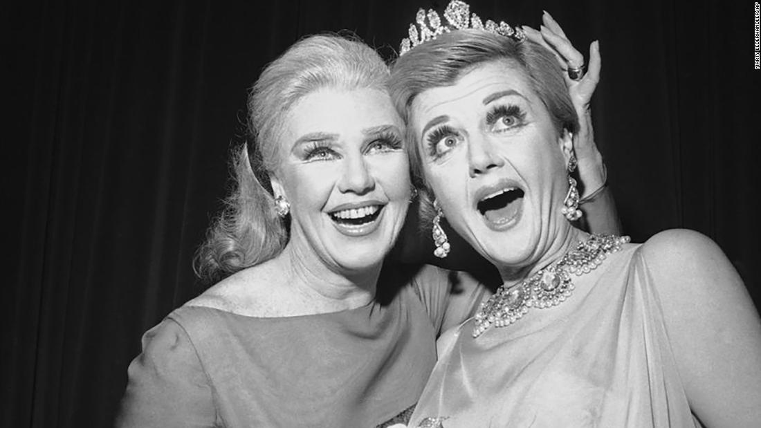 Lansbury, right, attends a charity ball with Ginger Rogers in 1966.