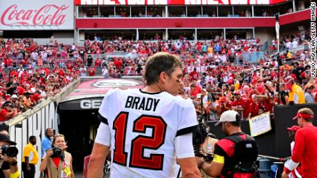 Tom Brady walks off the field after the Tampa Bay Buccaneers&#39; win over the Atlanta Falcons at Raymond James Stadium on October 9, 2022.