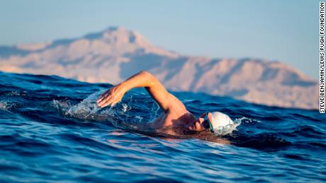 United Nations Patron of the oceans, Lewis Pugh, swims across the Gulf of Aqaba at the start of the Coral Swim on 11 October 2022