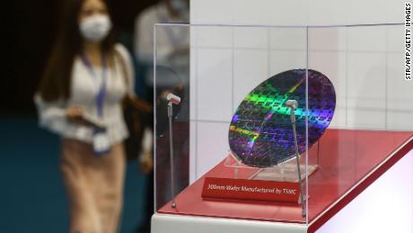 A chip by Taiwan Semiconductor Manufacturing Company (TSMC) is seen at the 2020 World Semiconductor Conference in Nanjing in China&#39;s eastern Jiangsu province on August 26, 2020. 