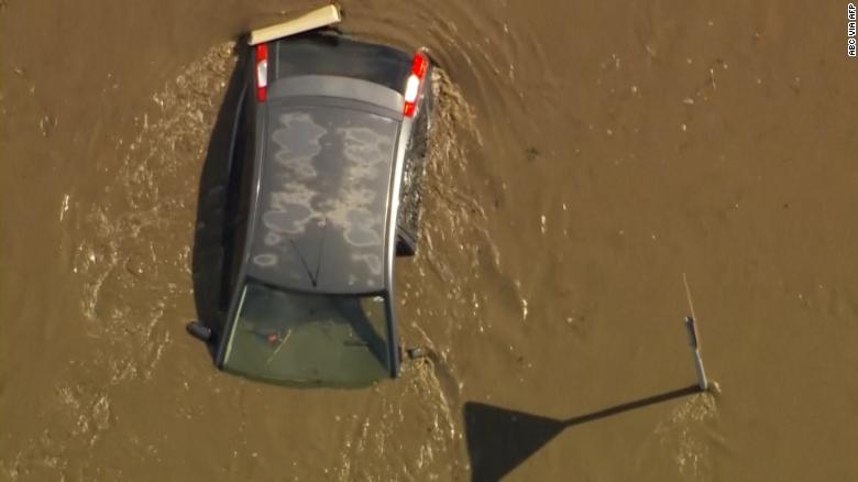 Homes, cars and horses under water in Australia's flash floods