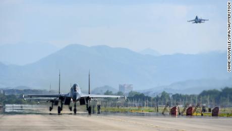 UK warns China is recruiting British pilots to train its military 