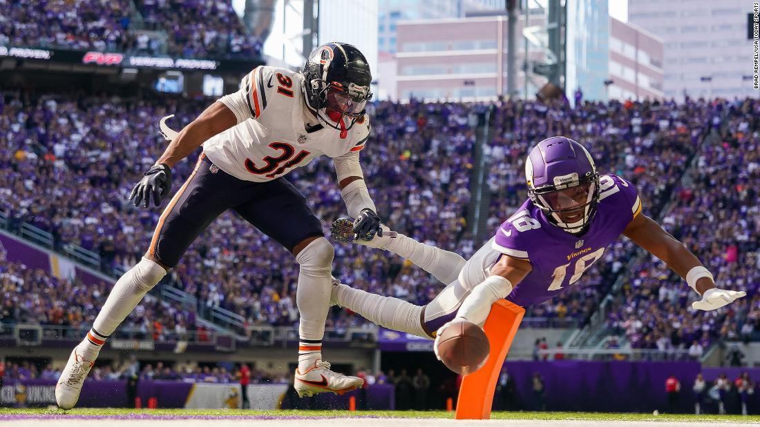 Minnesota wide receiver Justin Jefferson dives for a two-point conversion during the Vikings&#39; 29-22 victory over the Chicago Bears.