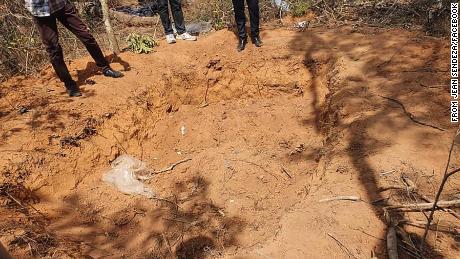 Malawi&#39;s Minister of Homeland Security, Jean Sendeza visited Mtangatanga forest where villagers discovered a mass grave with 25 bodies, and five more bodies were found after further search around the forest. (From Jean Sendeza)
