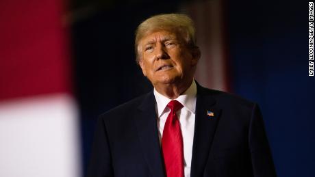 WARREN, MI - OCTOBER 01: Former President Donald Trump gets ready to speak during a Save America rally on October 1, 2022 in Warren, Michigan. Trump has endorsed Republican gubernatorial candidate Tudor Dixon, Secretary of State candidate Kristina Karamo, Attorney General candidate Matthew DePerno, and Republican businessman John James ahead of the November midterm election. (Photo by Emily Elconin/Getty Images)