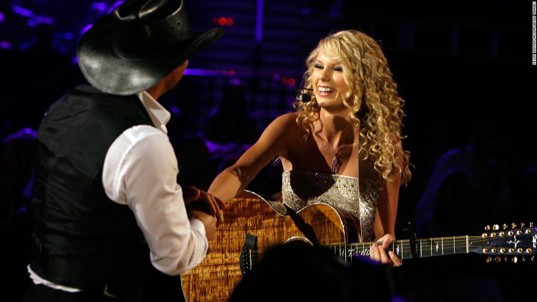Swift greets singer Tim McGraw after performing her debut single, titled &quot;Tim McGraw,&quot; during the 2007 Academy of Country Music Awards in Las Vegas.