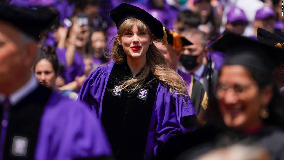 Swift delivers a commencement speech at New York University in May 2022. She received an honorary doctorate from the university.