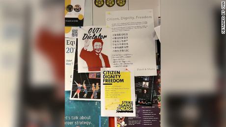 Anti-Xi posters are seen on a university campus in the Netherlands.