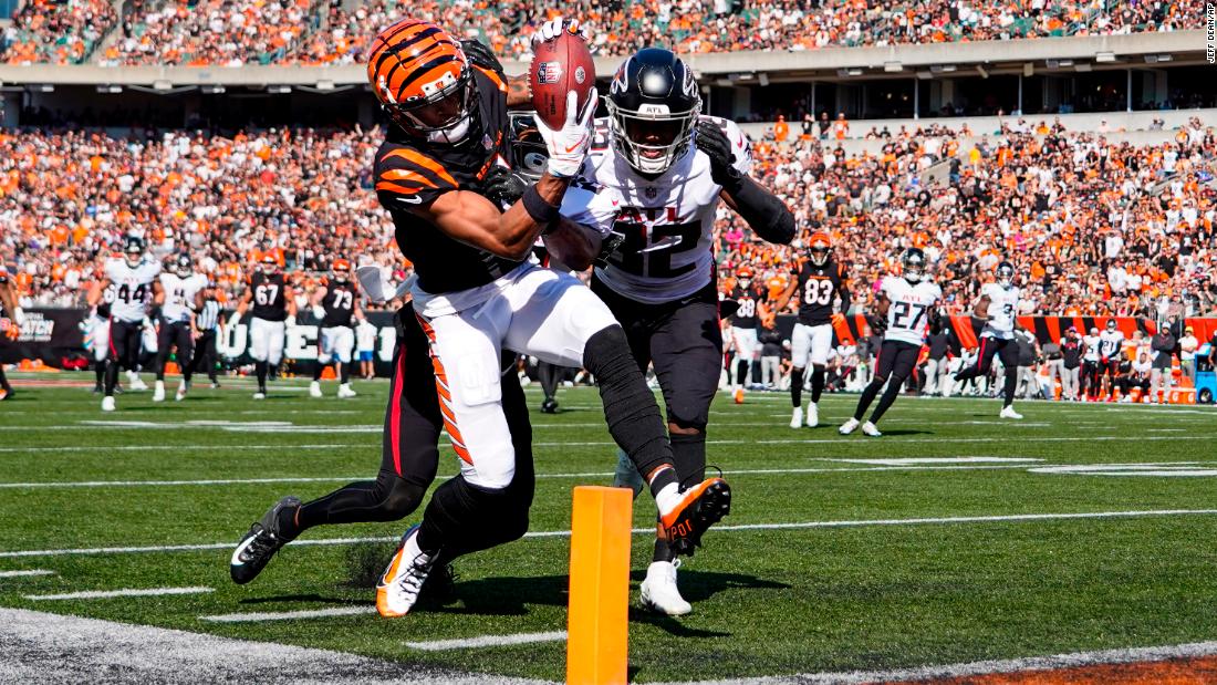 Cincinnati Bengals wide receiver Ja&#39;Marr Chase catches one of his two touchdowns on the afternoon over Atlanta Falcons cornerback Cornell Armstrong and safety Jaylinn Hawkins. The Bengals beat the Falcons 35-17 behind a monster performance from quarterback Joe Burrow, who threw 34-for-42 for 481 yards and three touchdowns.