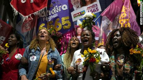 Women and candidates for the next general election protest against domestic violence, rape culture and femicide during the &quot;March of Flowers&quot; in Rio de Janeiro, Brazil, Wednesday, Sept. 21, 2022. 