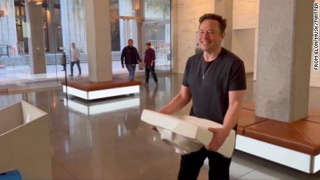 Elon Musk on Wednesday posted a video showing him entering Twitter&#39;s headquarters carrying a sink. His deal to buy the company is expected to close by Friday. 