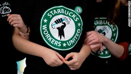 Starbucks employees and supporters react as votes are read during a union-election watch party on Thursday, Dec. 9, 2021, in Buffalo, N.Y.  