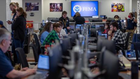 Technicians monitor Hurricane Ian at FEMA headquarters in Washington, DC, September 28.