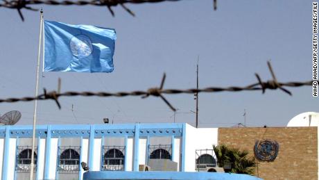 Picture shows the UN headquarters encircled with barbed wire in Baghdad 25 September 2002. The international spotlight has been thrown back on the UN Security Council, the most controversial part of the United Nations, as debate rages over whether to pass a new resolution on Iraq. AFP PHOTO/Awad AWAD (Photo by AWAD AWAD / AFP) (Photo by AWAD AWAD/AFP via Getty Images)