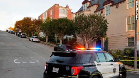 A police car blocks the street below the home of Paul Pelosi, the husband of House Speaker Nancy Pelosi, in San Francisco, Friday, Oct. 28, 2022. Paul Pelosi, was attacked and severely beaten by an assailant with a hammer who broke into their San Francisco home early Friday, according to people familiar with the investigation. (AP Photo/Eric Risberg)