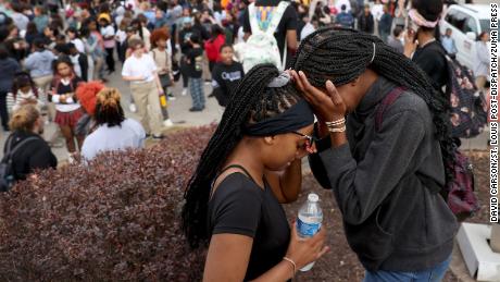High School students were evacuated to a parking lot from the Central Visual &amp; Performing Arts High School after a shooting on October 24, 2022 in St. Louis, Missouri. 