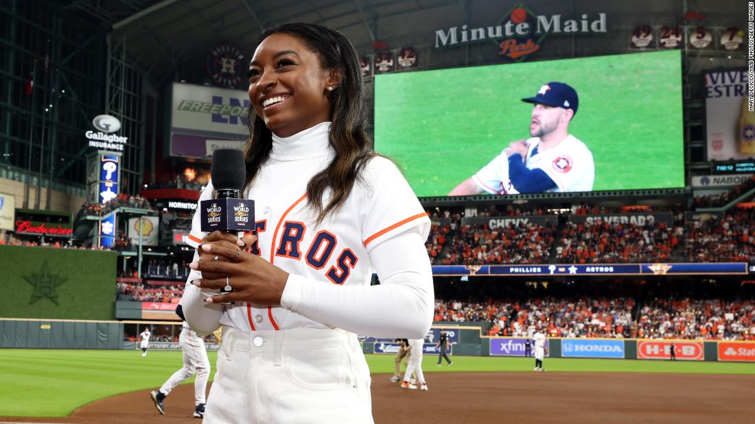 Olympic gymnast Simone Biles, who is from the Houston area, gives the &quot;play ball&quot; announcement before Game 1.