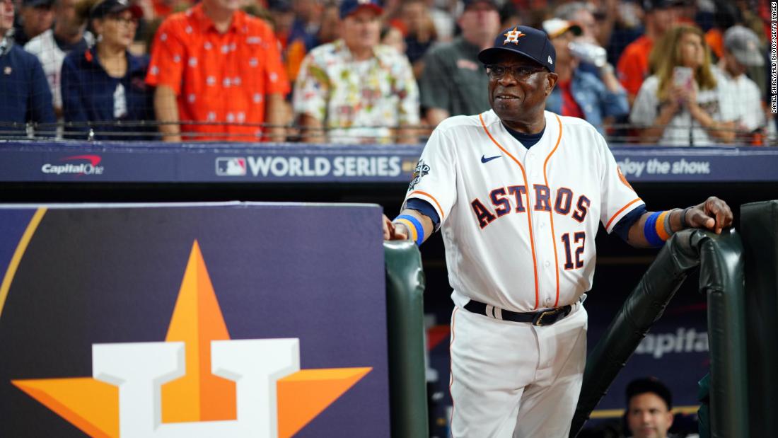 Houston manager Dusty Baker watches from the dugout during Game 1&#39;s opening ceremony. The 73-year-old is the oldest manager in World Series history.