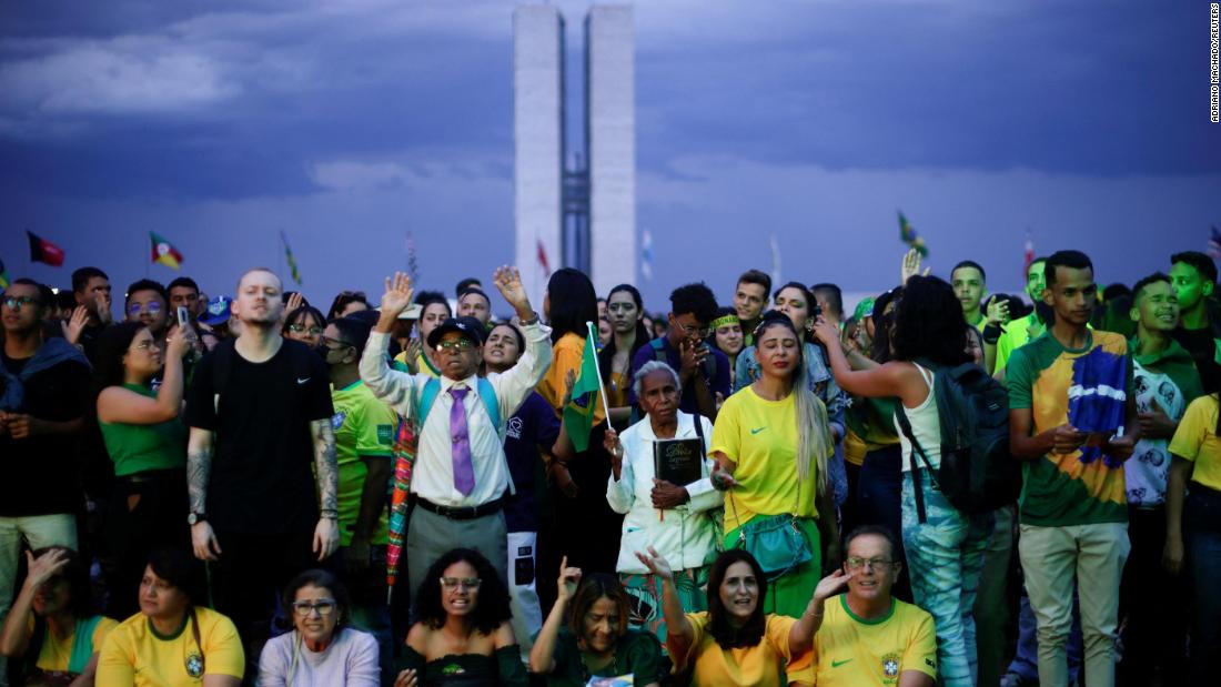 Evangelical supporters of Bolsonaro attend a campaign rally in Brasília on October 28. Brazilian evangelical voters have become a major point of contention for both candidates throughout the election.