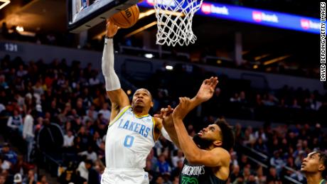 Westbrook goes up for a shot while Karl-Anthony Towns defends in the fourth quarter.