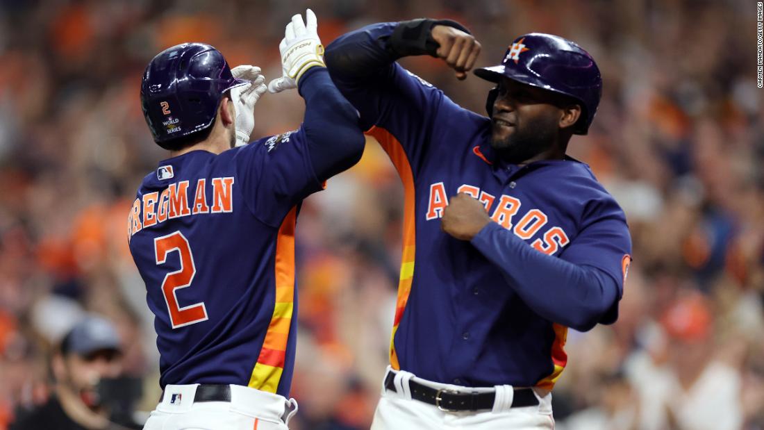Houston&#39;s Alex Bregman and Yordan Álvarez celebrate after Bregman hit a two-run home run in Game 2 on Saturday, October 29. The fifth-inning blast gave the Astros a 5-0 lead, and they held on to win 5-2 and tie the series at one game apiece.