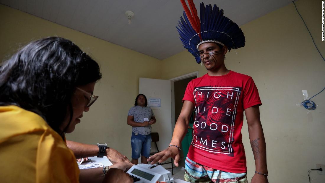 Elenilson da Silva Sobrinho, an indigenous Brazilian, votes in the community of Sahu-Apé in the Amazonas region on October 30.
