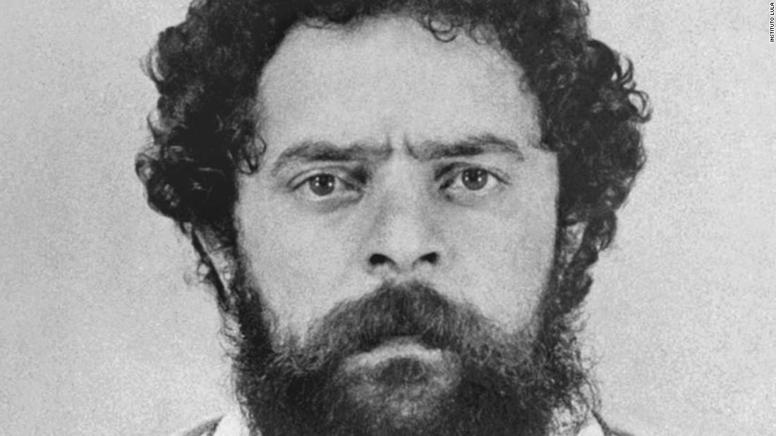 Lula poses for a mugshot in 1980 after being arrested for organizing a metalworkers union strike. He spent 31 days in jail. 