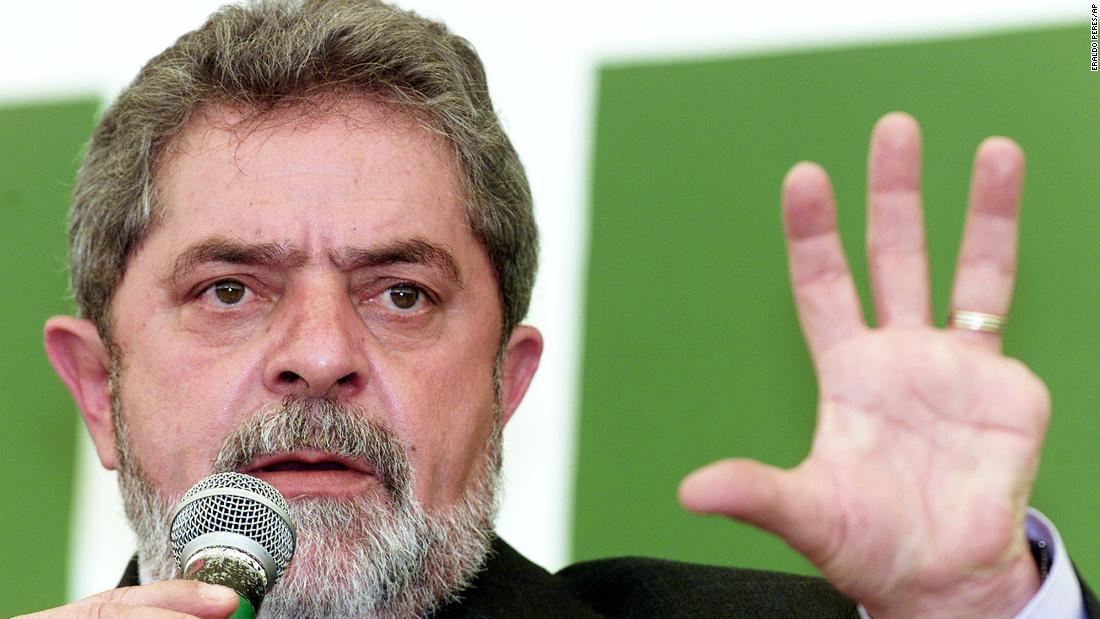 Lula speaks during debate with students and teachers at the University of Brasília in 2002. He lost his left pinky finger at the age of 19 while working in an automobile parts factory.