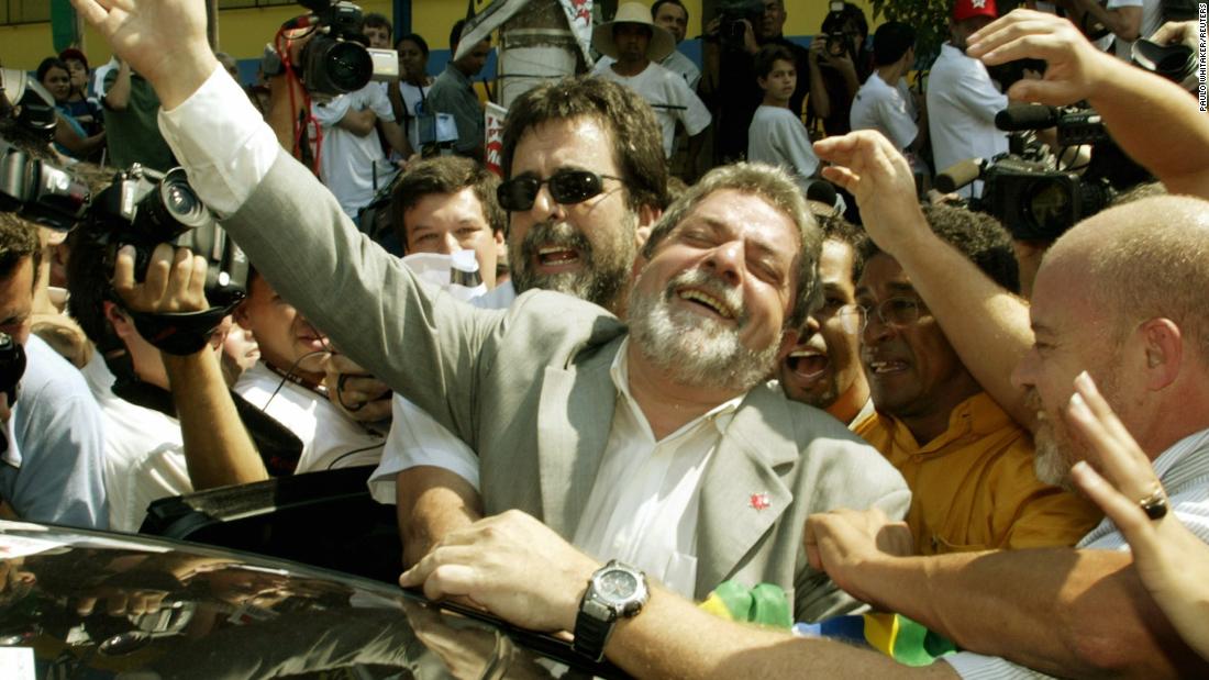 Lula waves to supporters after casting his ballot in his hometown of São Bernardo do Campo in 2002. This was Lula&#39;s second presidential run where he would go on to win with 61.3% of the vote.