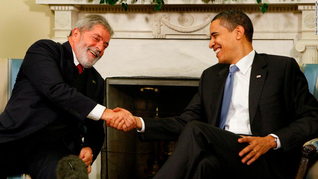 President Barack Obama greets Lula during their meeting in the Oval Office of the White House in 2009.