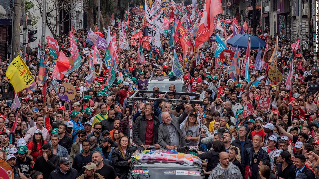 Lula greets supporters in São Paulo on the eve of the general election in October 2022.