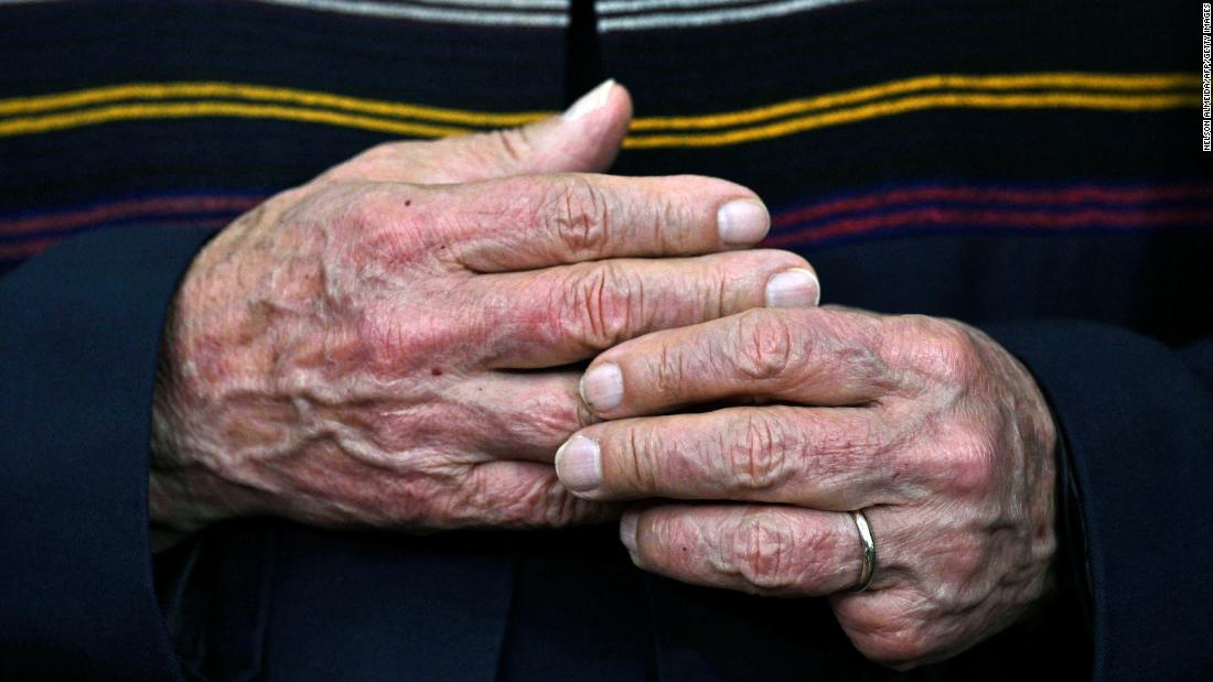 Lula&#39;s hands are seen during a meeting with Franciscan friars at his campaign headquarters in São Paulo in October 2022.