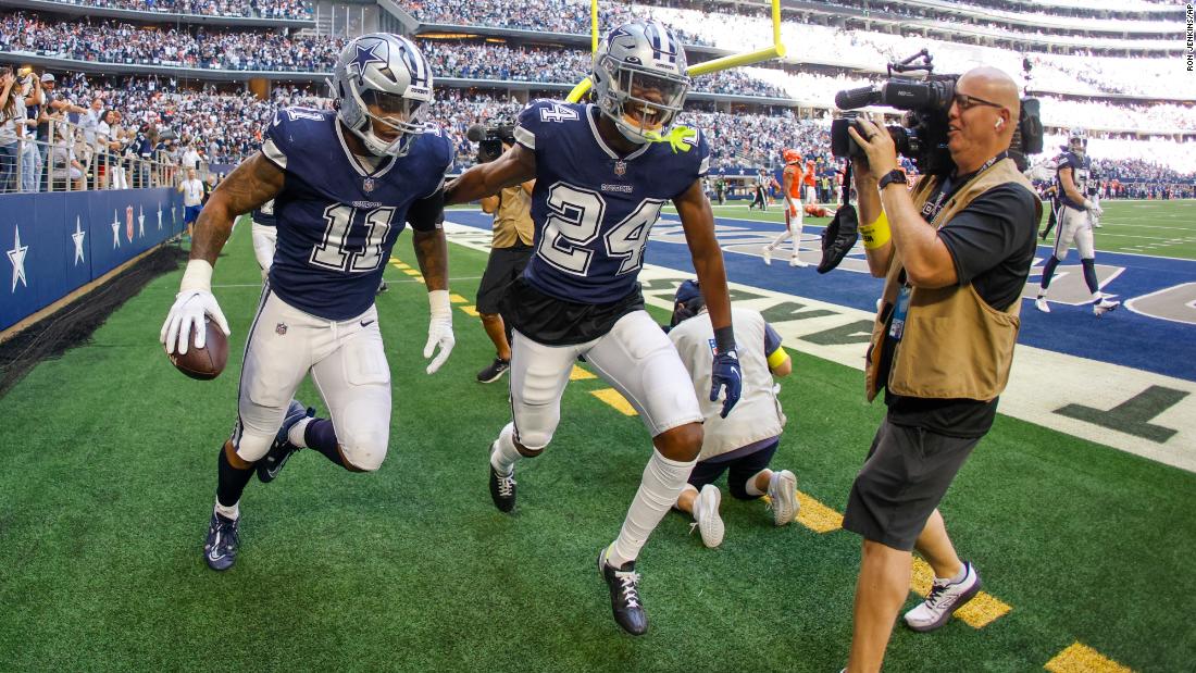 Dallas Cowboys&#39; Micah Parsons celebrates his fumble recovery and touchdown run during the second half against the Chicago Bears. The Cowboys dominated the Bears, winning 49-29, with running back Tony Pollard scoring three rushing touchdowns. 