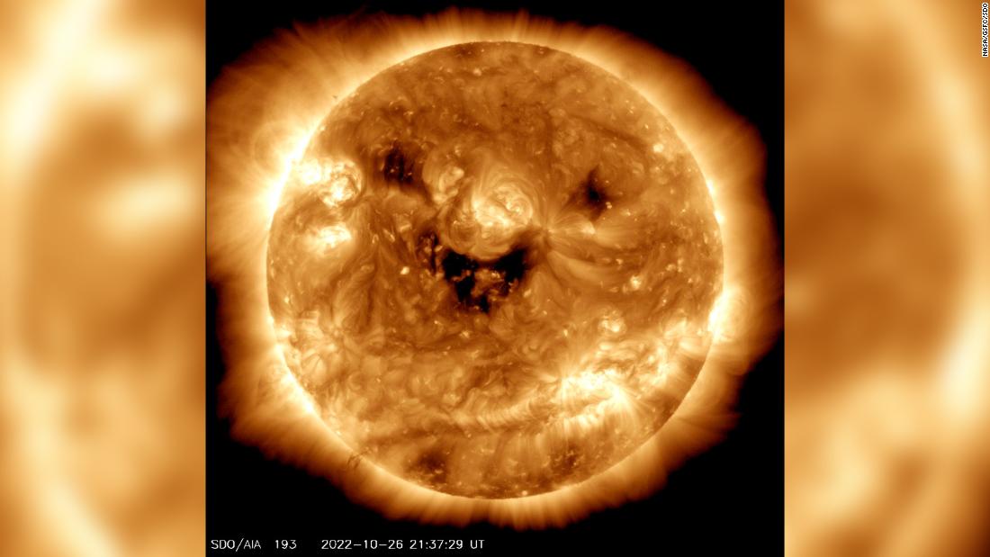 NASA captures eerie image of the sun 'smiling' | CNN
