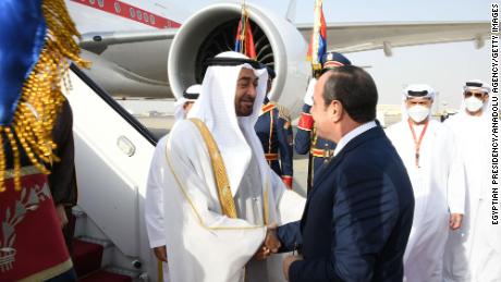 Egyptian President Abdel Fattah Al-Sisi (R) welcomes then Crown Prince of Abu Dhabi, Mohammed bin Zayed (L) at Cairo International Airport on April 24, 2022. 