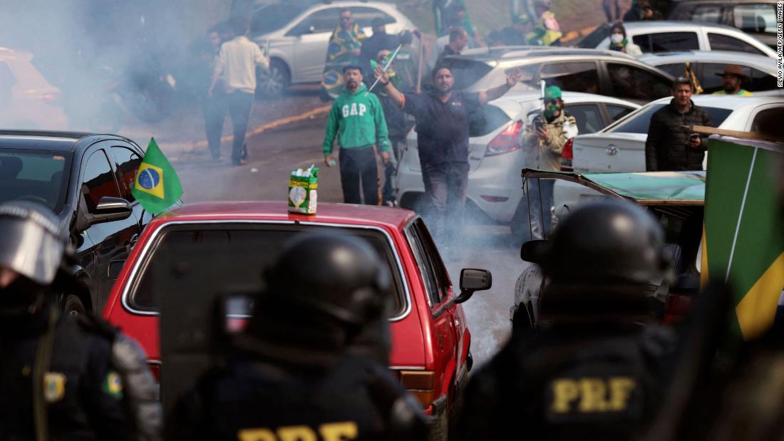 Police try to disperse Bolsonaro supporters who were blocking a highway in Novo Hamburgo, Brazil, on November 1.