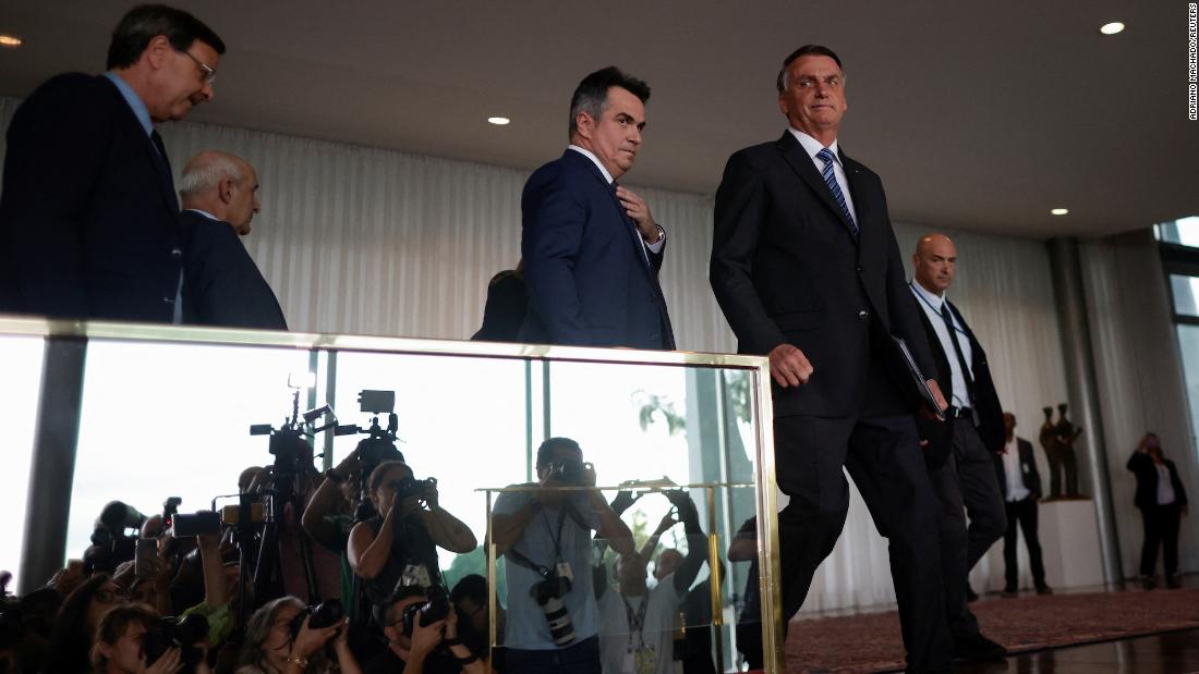 Bolsonaro arrives to give a statement to the press at the presidential palace in Brasília on November 1. He said he would &quot;follow all the orders and prescriptions of the constitution&quot; during a &lt;a href=&quot;https://www.cnn.com/2022/10/31/americas/brazil-election-result-explainer-intl-latam/index.html&quot; target=&quot;_blank&quot;&gt;short and ambiguous&lt;/a&gt; speech after days of silence following his election loss.
