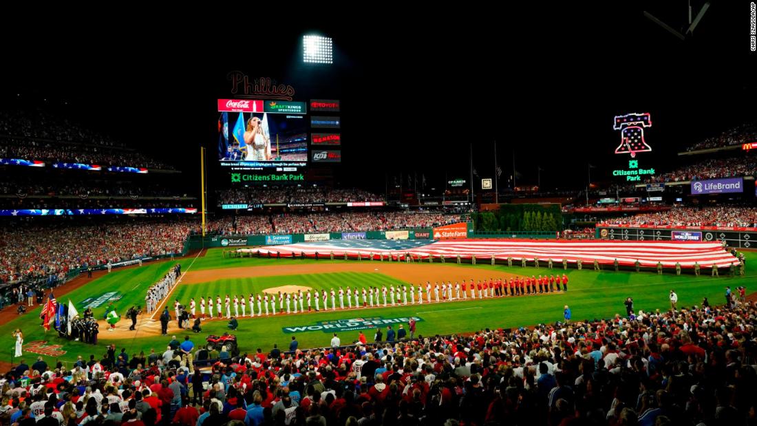 Players line up for the National Anthem before Game 3. It was the first World Series game in Philadelphia since 2009.