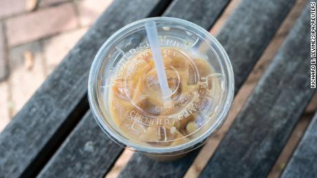 Iced coffee in a &quot;compostable&quot; plastic cup in New York in August.