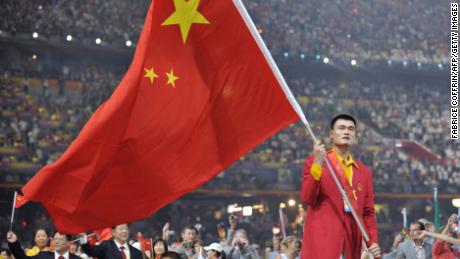 Chinese basketball star Yao Ming leads the Chinese delegation during the opening ceremony of the 2008 Beijing Olympic Games in Beijing on August 8, 2008. 