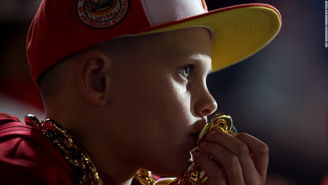 A young Phillies fan is seen wearing a gold chain Wednesday.
