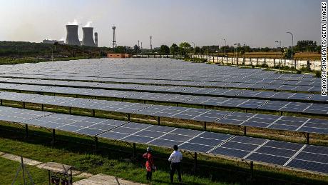 While India&#39;s renewable energy sector is rapidly increasing, the country remains largely reliant on coal. Here, solar panels are seen at the National Thermal Power Corporation (NTPC) plant, which is primarily coal-fired. 