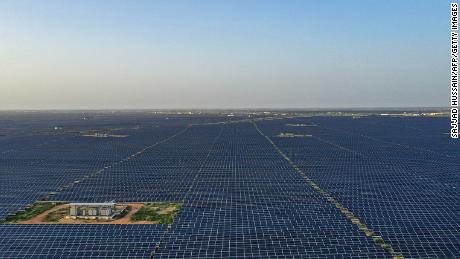 This photo taken on October 6, 2021 shows solar panels at the Bhadla Solar Park in the northern Indian state of Rajasthan.