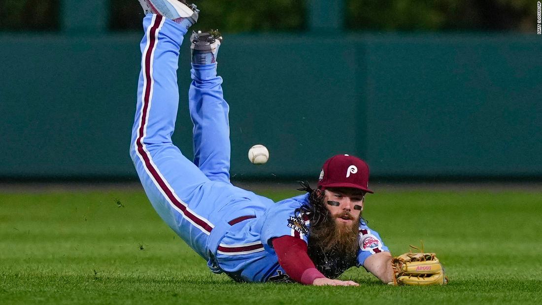 Phillies center fielder Brandon Marsh can&#39;t get a glove on a double by Houston&#39;s Yuli Gurriel.