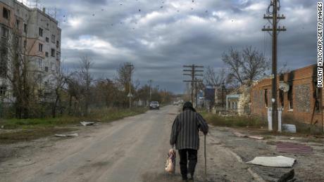 An old woman walks in the Kherson region Much of the Kherson region has been in Russian control since the early weeks of its invasion.