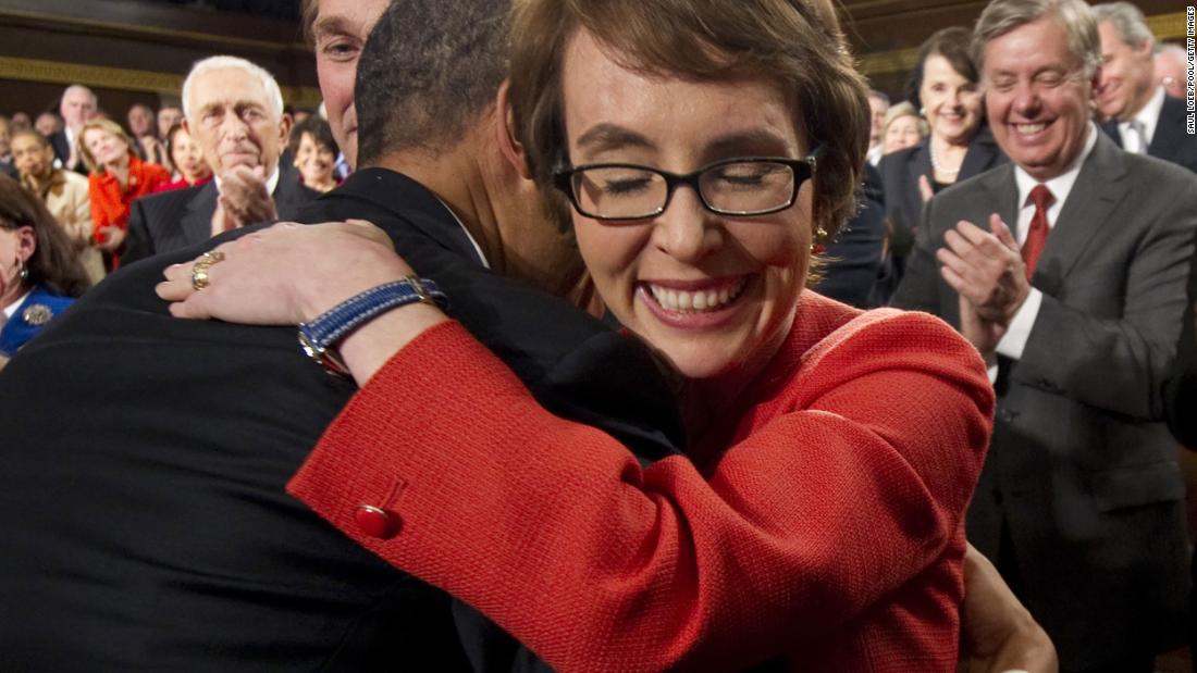 President Barack Obama embraces Giffords before his State of the Union address in January 2012.