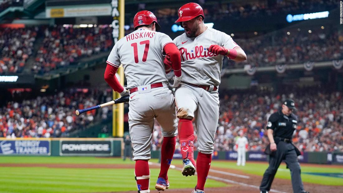 Schwarber celebrates his home run with teammate Rhys Hoskins on Saturday.
