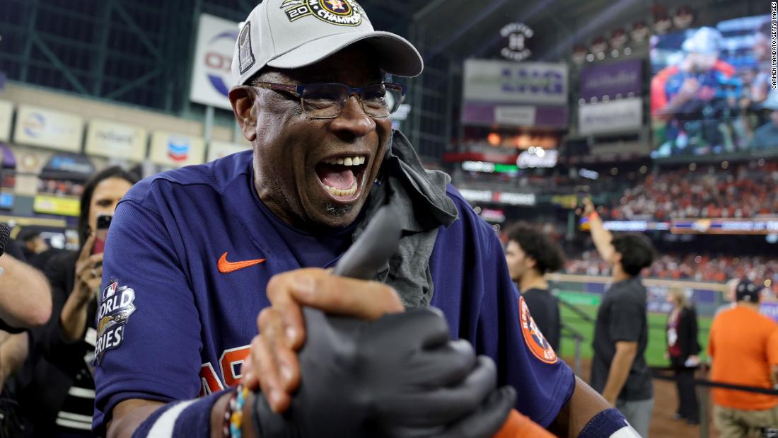 Houston manager Dusty Baker celebrates on the field after his team&#39;s victory on Saturday.